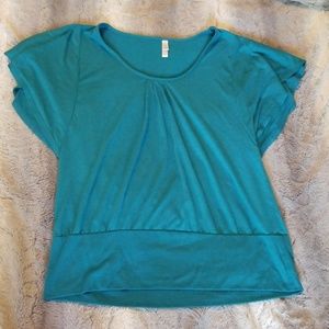Large dark teal top. Flowy sleeves.